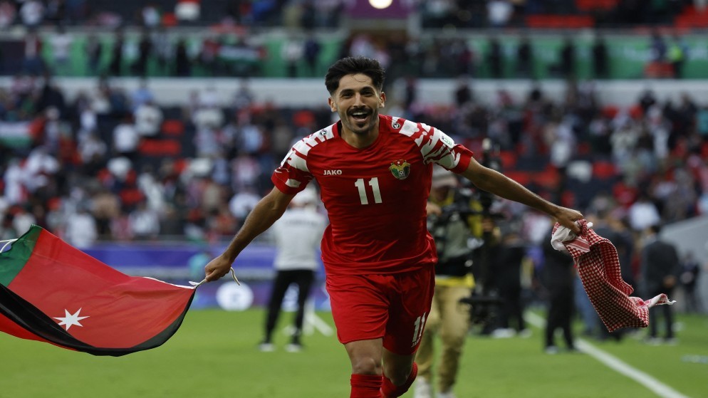 مهاجم المنتخب الوطني يزن النعيمات خلال بطولة كأس آسيا في قطر في 2023. (أ ف ب)