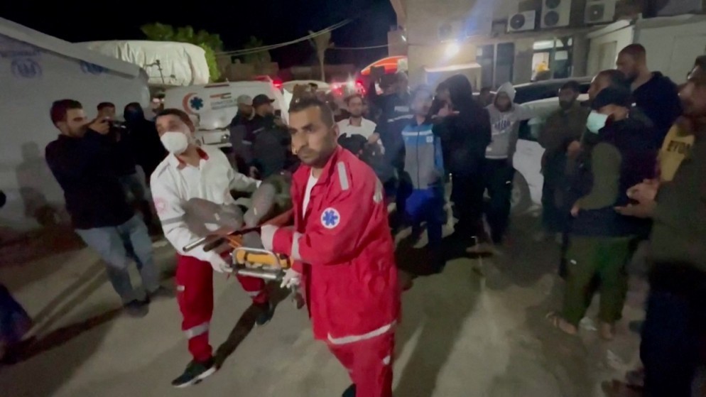 جثة عامل في المطبخ المركزي العالمي في غزة. (رويترز)