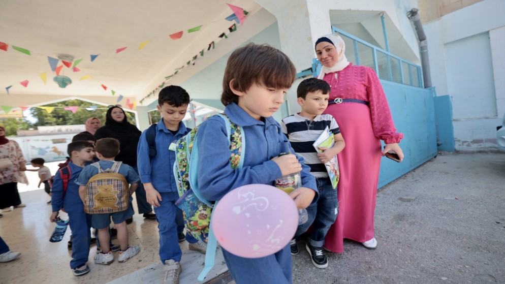 طلبة مدرسة سعيد علاء الدين الأساسية للبنين في أبو نصير بالعاصمة عمّان. (صلاح ملكاوي/ المملكة)